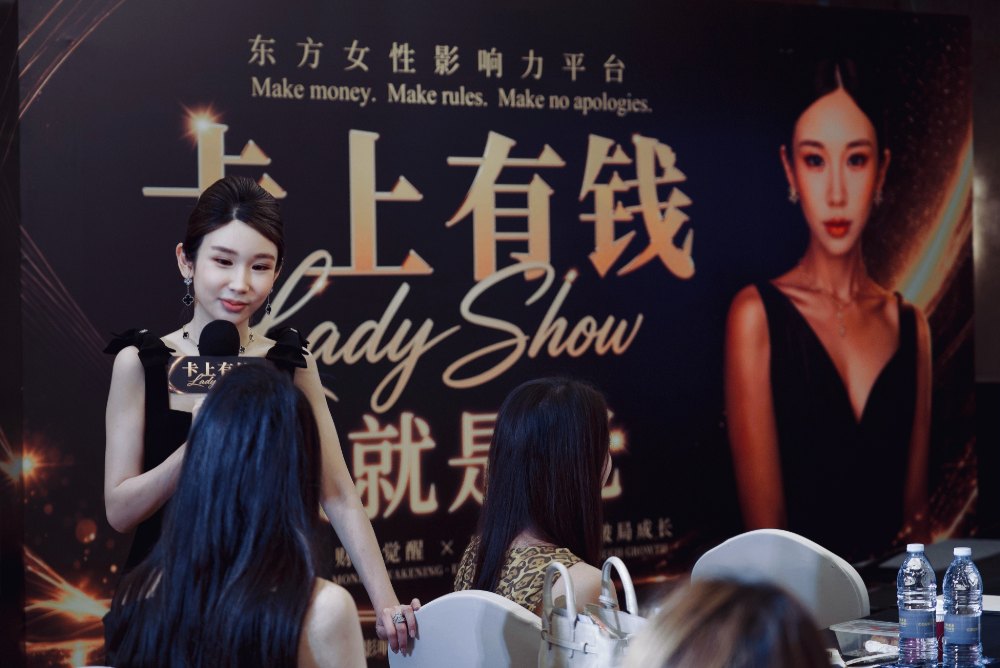 A speaker addressing the room at LADYSHOW